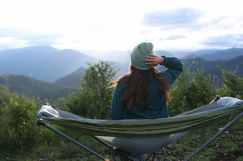 mountain camping adventure with free standing hammock