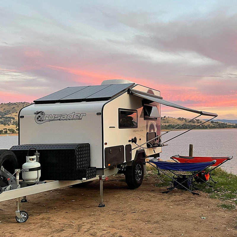 rv camping by the lake with free standing hammock