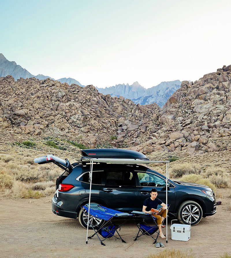van camping with portable free standing hammocks