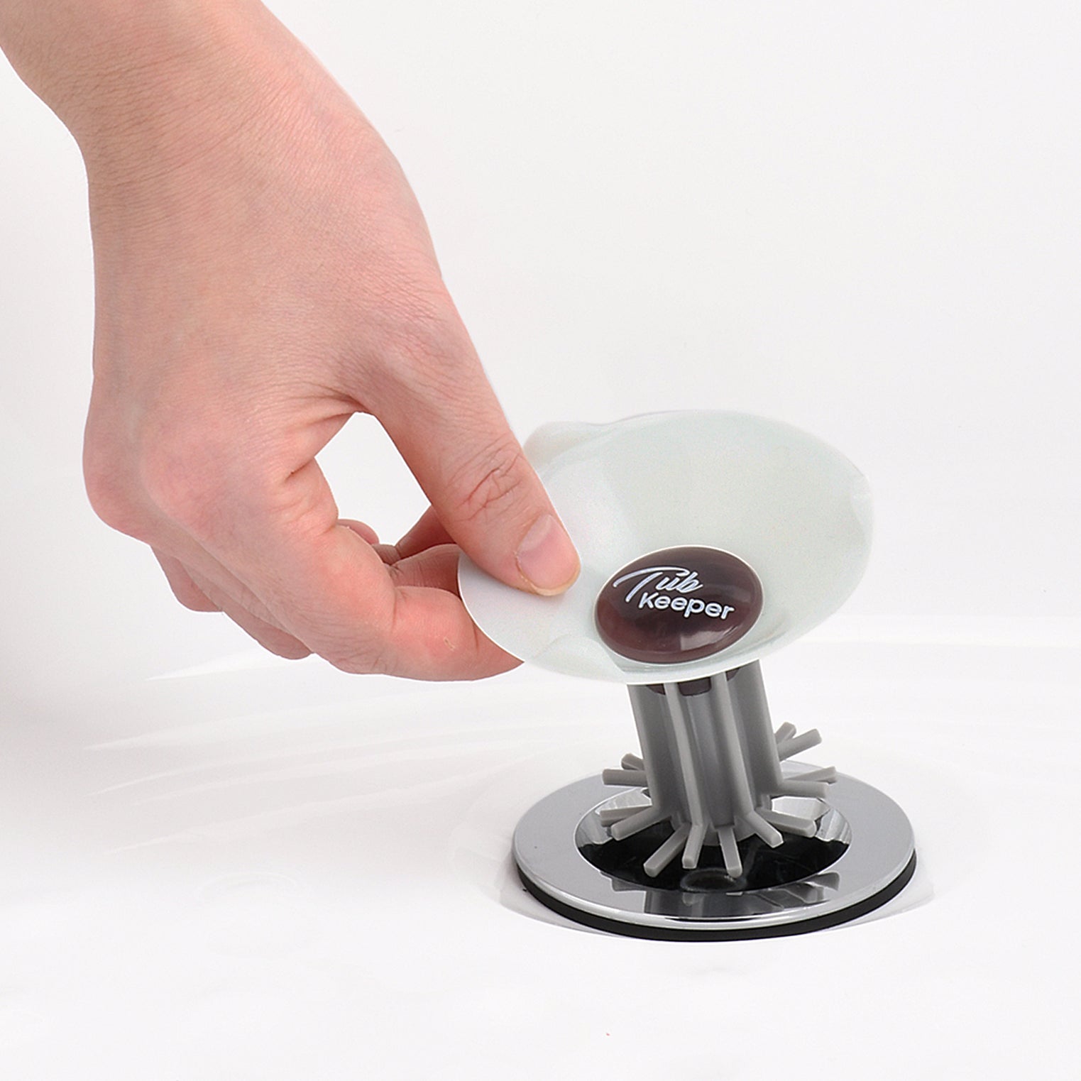 TubKeeper Fits most bathtub drains TubKeeper Fits most bathtub drains