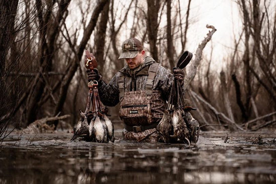 the hunter with TideWe Hunting Waders is standing in the water