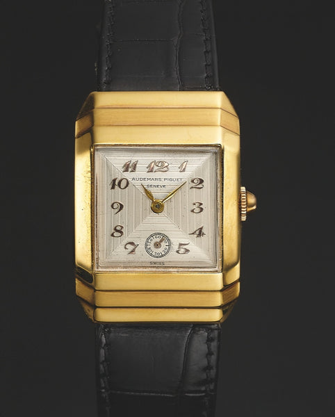 a vintage audemars piguet luxury watch from the 1930s with a yellow gold case