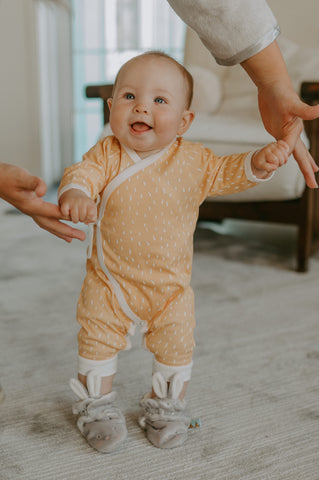 Baby in Romper Clothing from Bunnies By The Bay