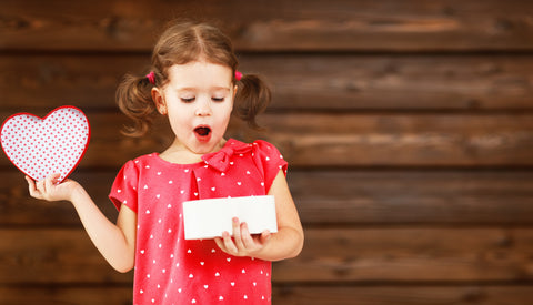 Little Girl Opening Valentine's Card