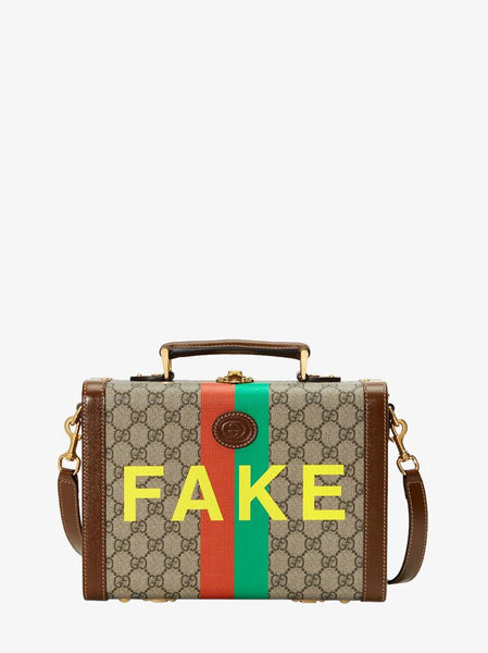 gucci small suitcase