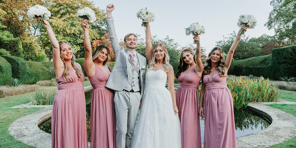 bridesmaids in pink bridesmaid dresses