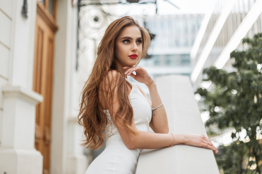 a stylish lady in a white dress