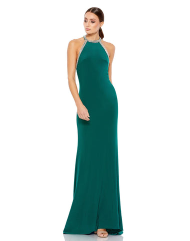 a rich hunter green fit-and-flare dress with a bejeweled neckline and backless design