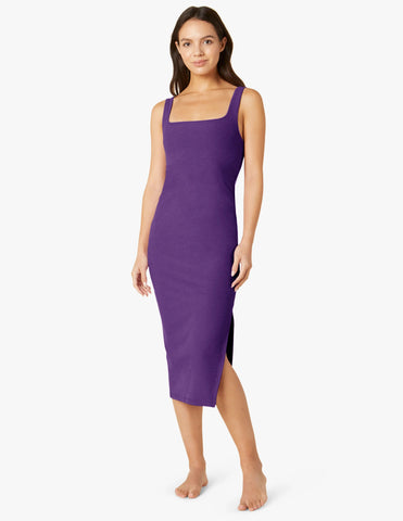 a rich purple fitted dress