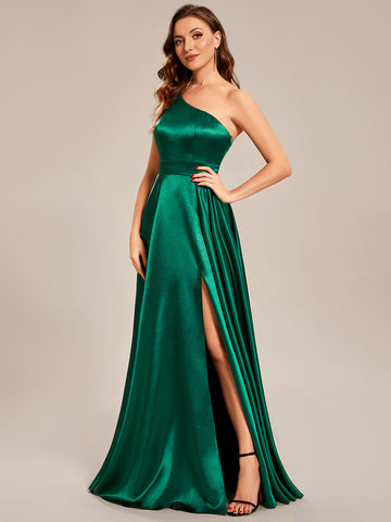 a floor-length forest green ballgown