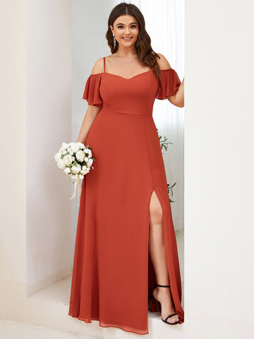 A burnt orange cold shoulder maxi dress