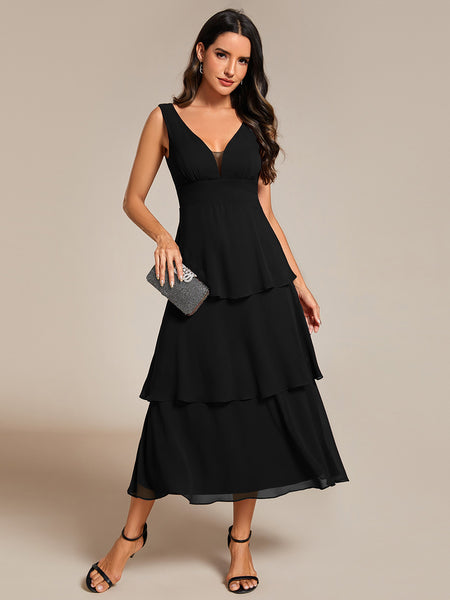 sleeveless dress with tiered skirt