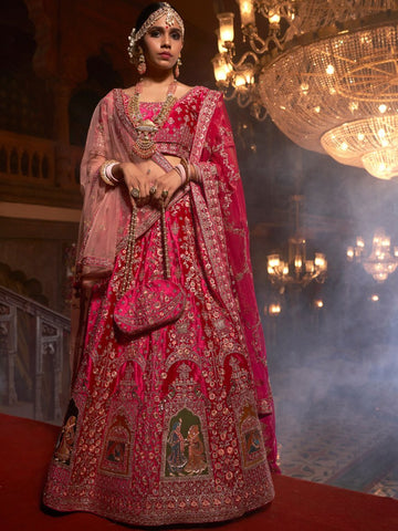 Pink Heavy Embroidered Bridal Wear Lehenga Choli - Rent