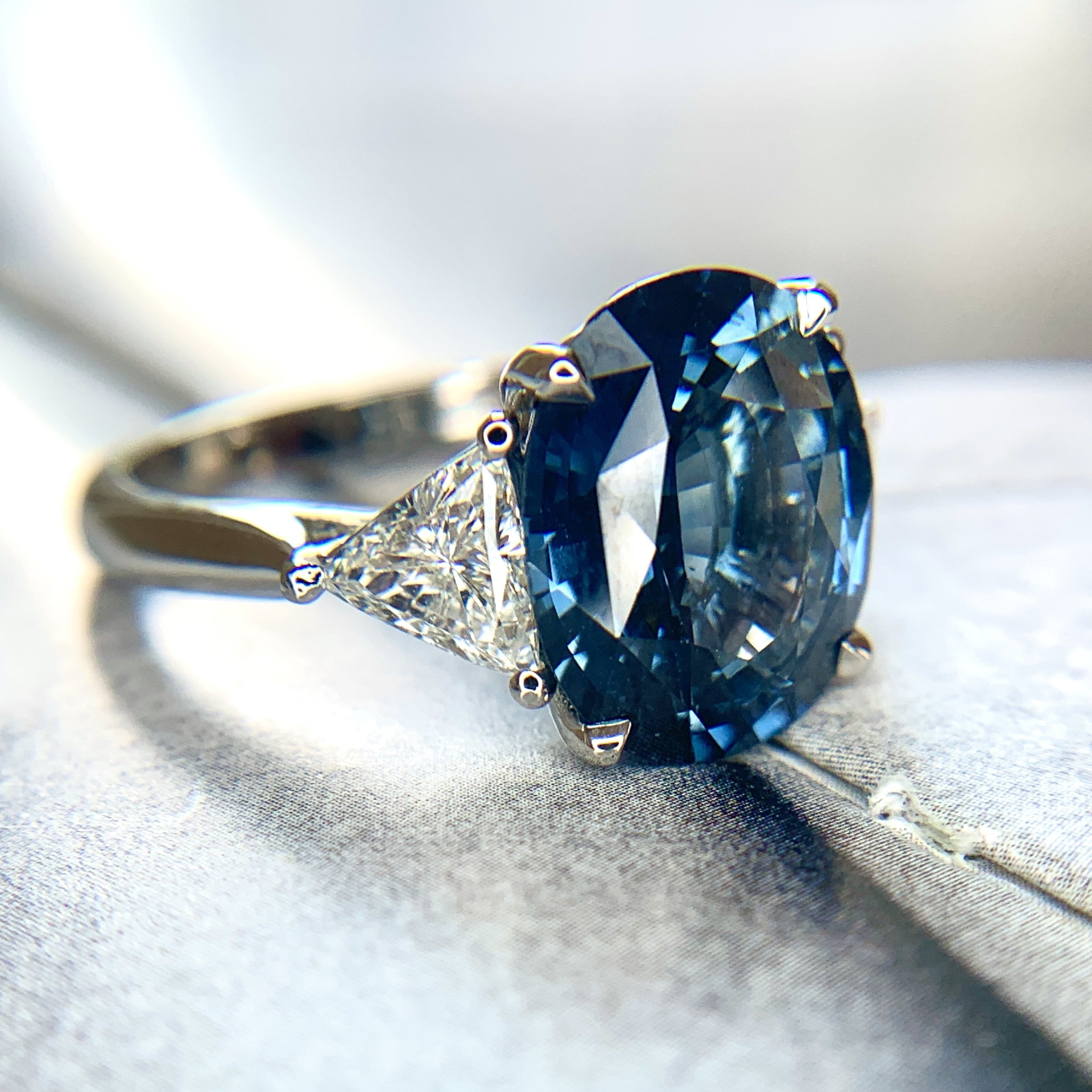 Juno 5.69ct Blue Oval Sapphire Engagement Ring with Trilliant Diamond Accents