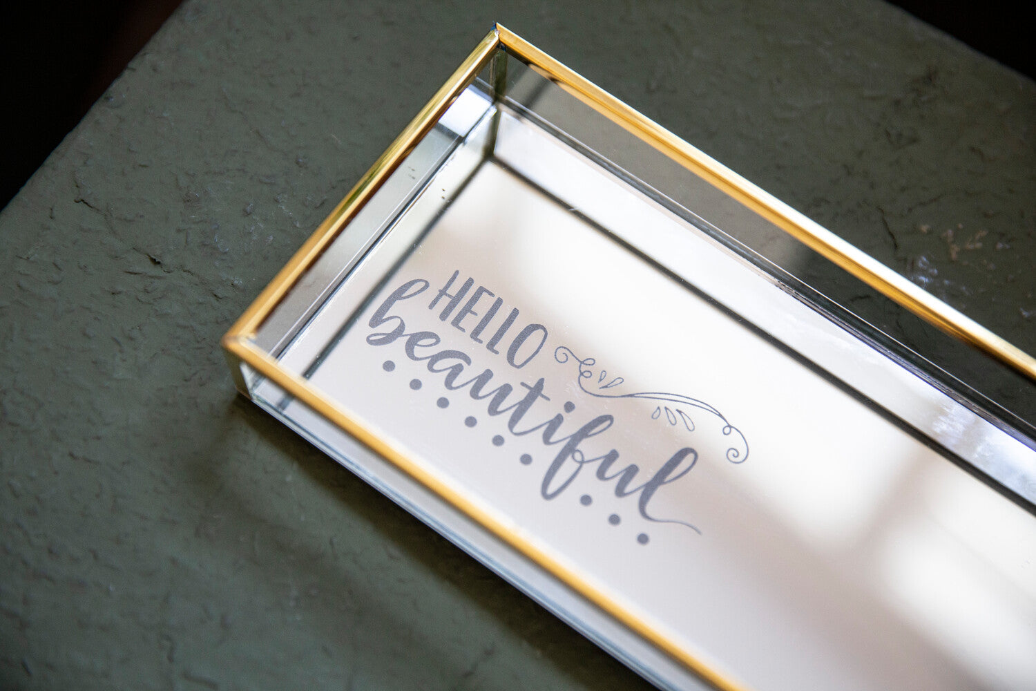 Engraved mirror