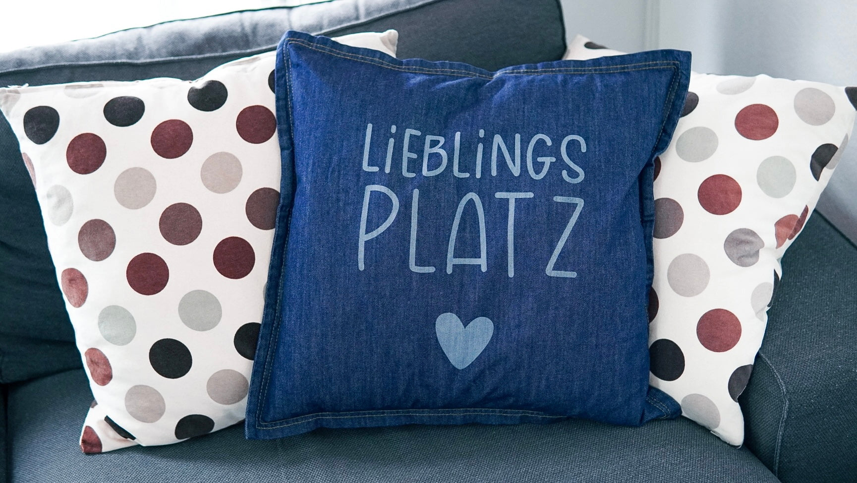 Engraved denim pillow