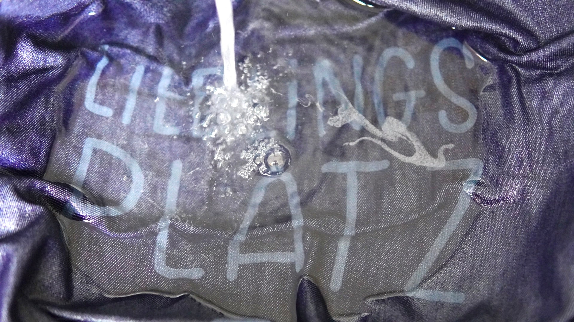 Wash out jeans after engraving