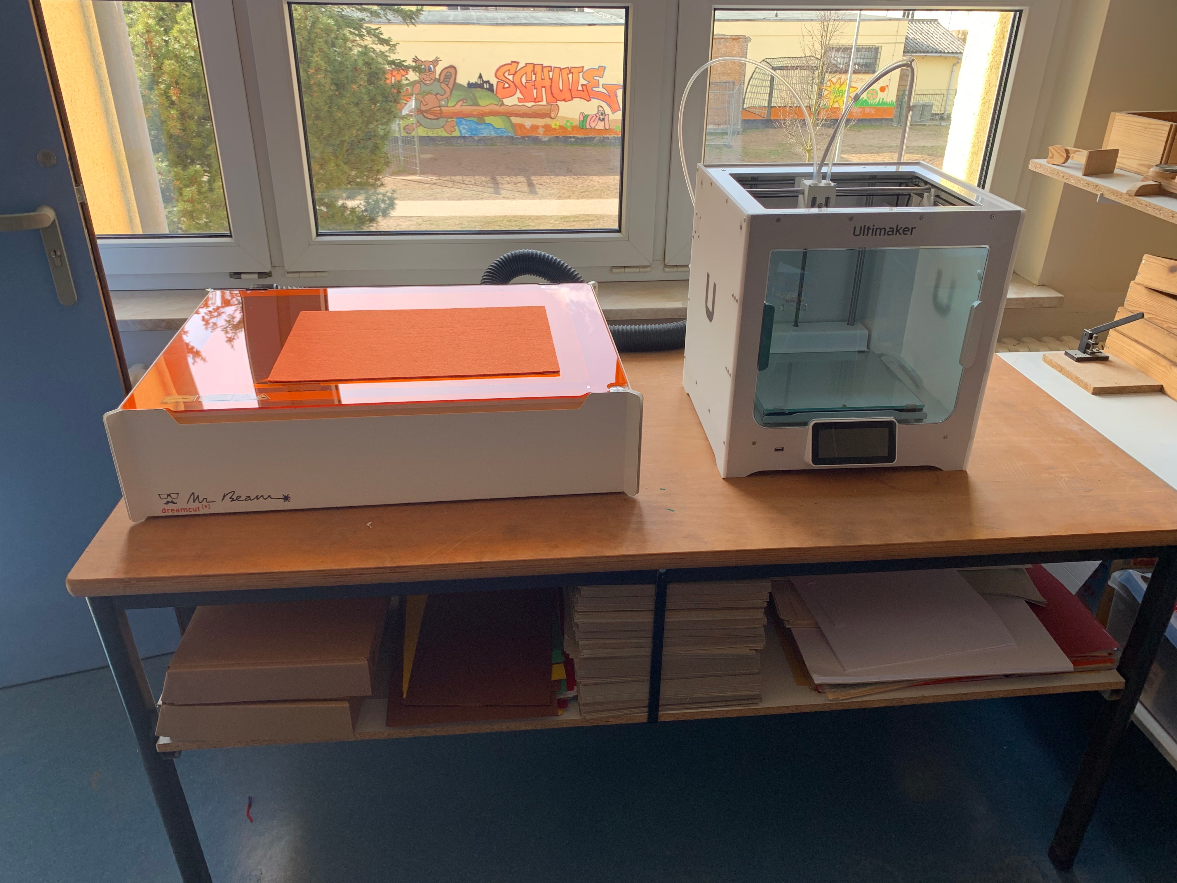 3D printers and laser cutters