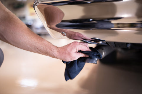 Applying Metal Polish to clean and restore an exhaust tip