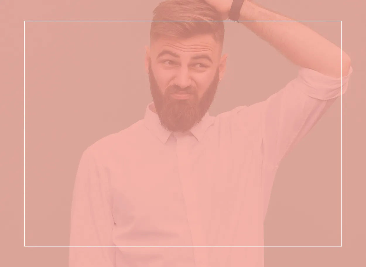 Bearded man scratching his head. He’s clearly baffled about the difference between sensitization and allergy.