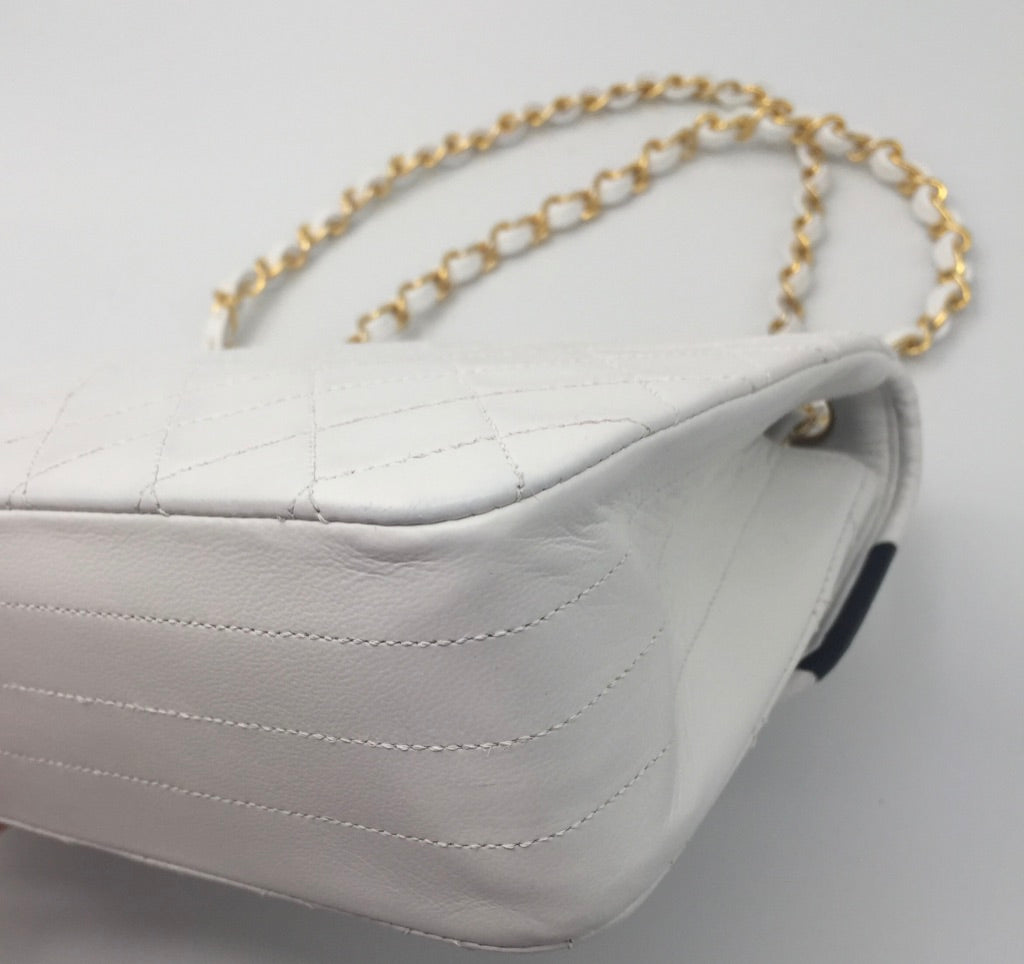 white and gold chanel bag