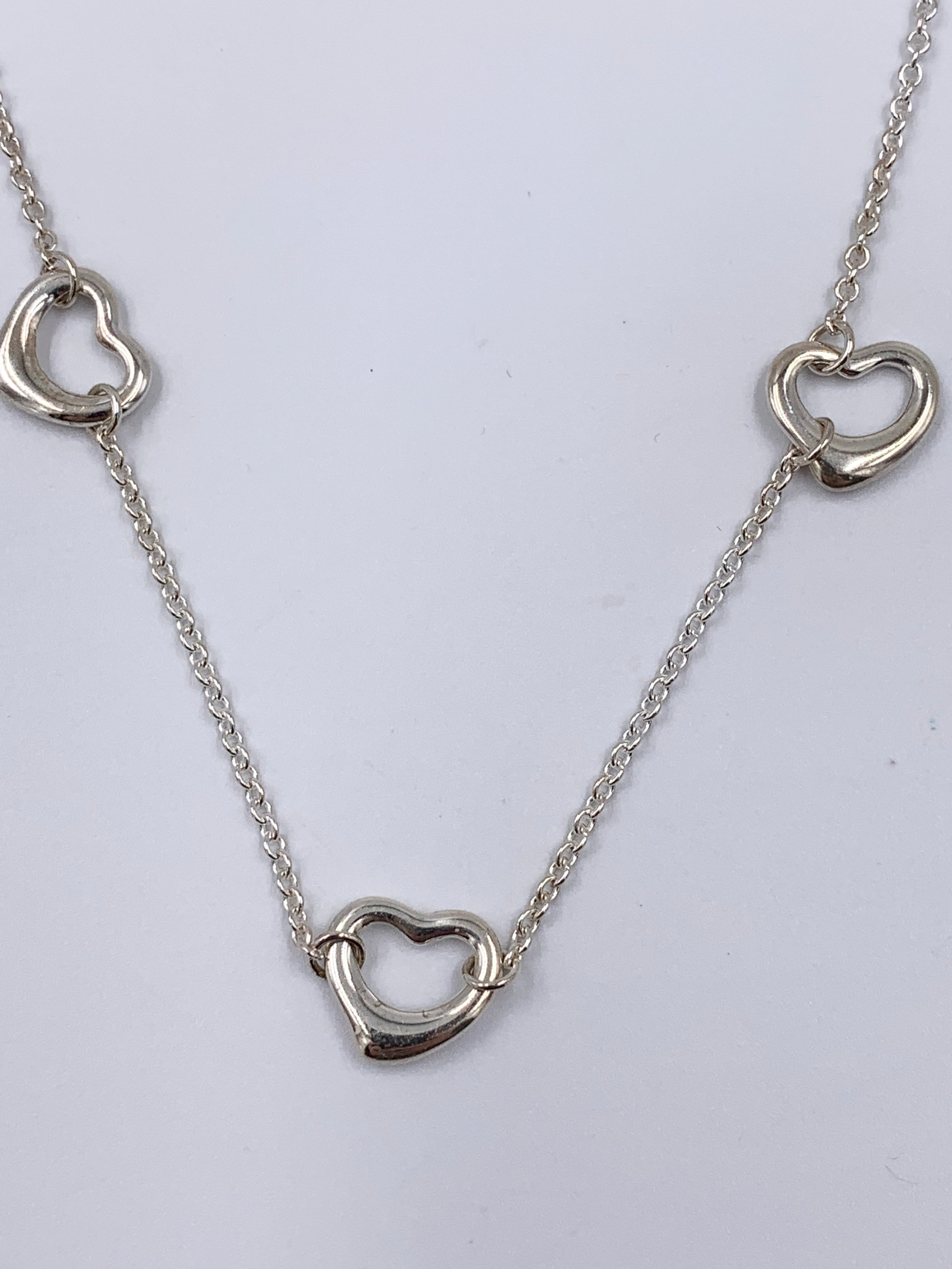 tiffany three heart necklace