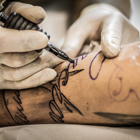 Tattooist at work