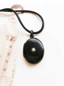 Antique Victorian black enamel and pearl mourning locket.