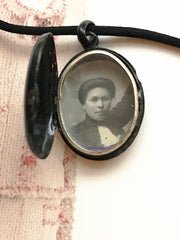 Victorian black enamel and pearl mourning locket with photograph