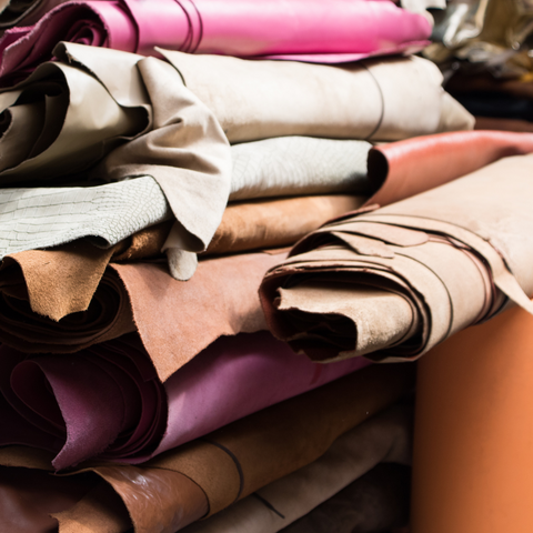 a stack of rolls of leather