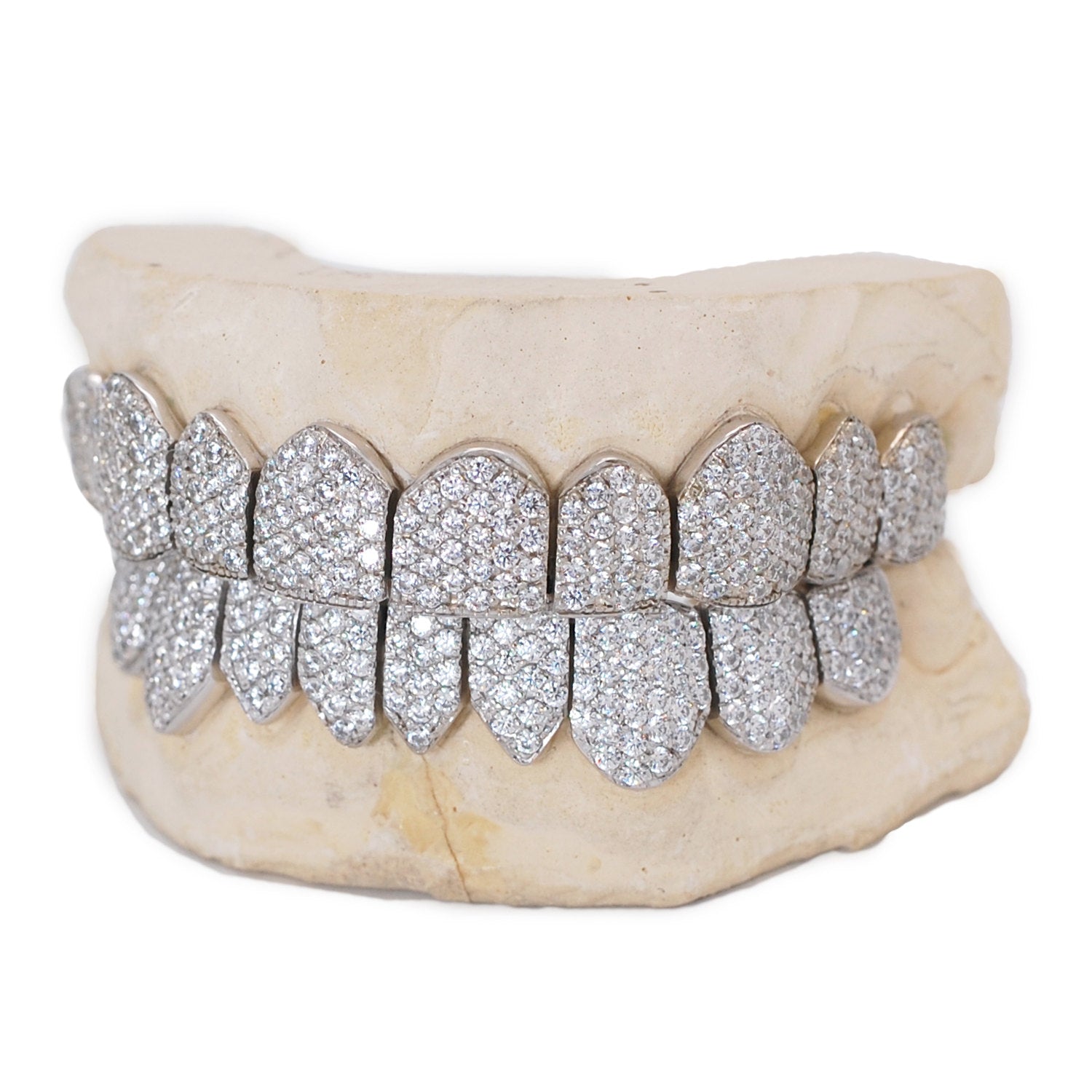 Shine bright with our diamond grillz, encrusted with high-quality diamonds for the ultimate in luxury and style