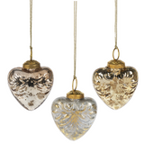 three gold embossed heart ornaments