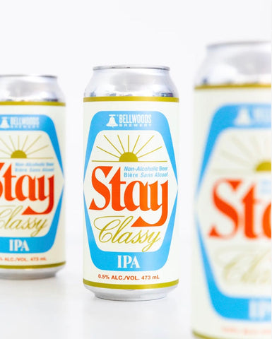 Photo of three cans of Stay Classy non-alcoholic IPA by Bellwoods Beer
