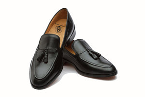 black loafers with tassels