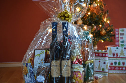 Christmas gift basket with food and wine