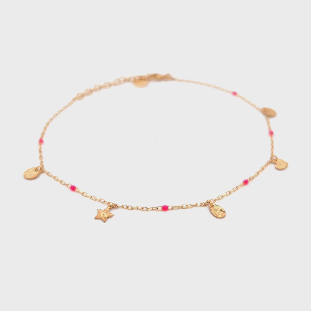 Anklets - Anklet charms and fuchsia enamel detail - Anklets Mania - thumbnail - video - 1 | Rue des Mille