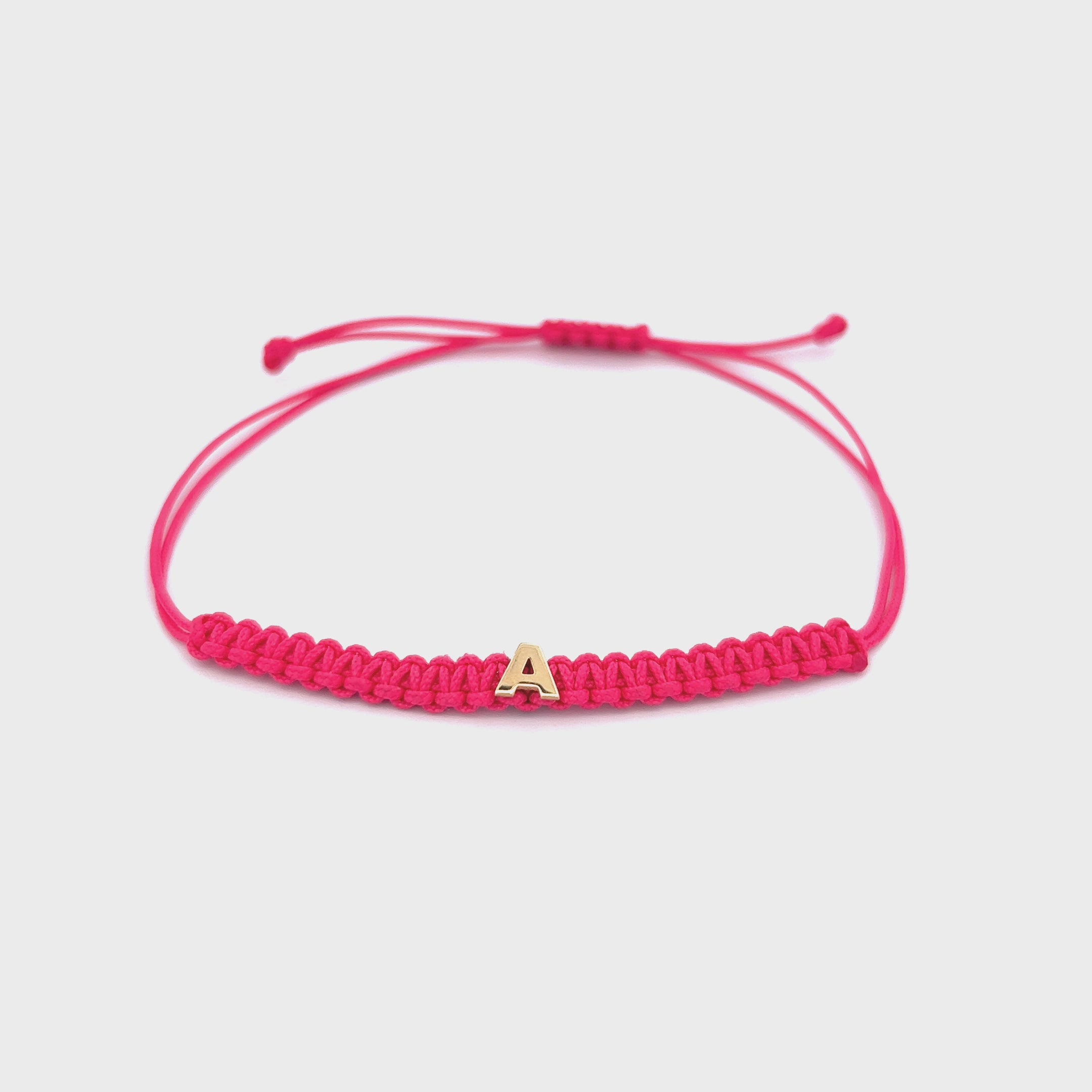 Bracciali - Bracciale tessuto rosa con lettera - ORO18KT - thumbnail - video - 1 | Rue des Mille