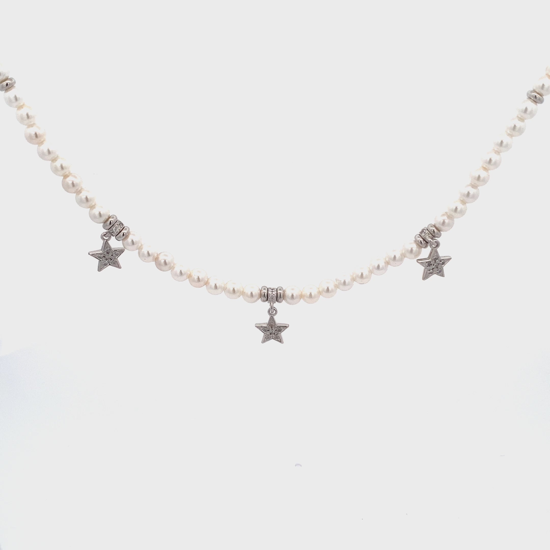 Chokers - ELASTIC NECKLACE WITH PEARLS AND THREE STARS - GALACTICA ICE - thumbnail - video - 1 | Rue des Mille