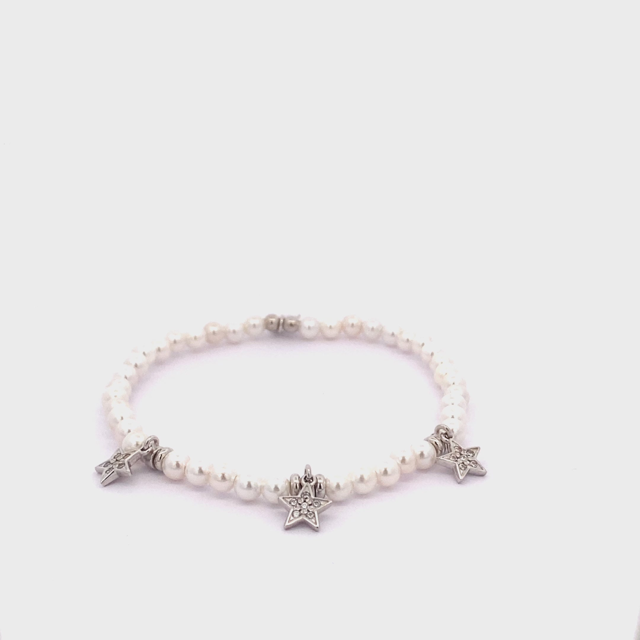 Bracelets - ELASTIC BRACELET PEARLS 3 STARS - GALACTICA ICE - thumbnail - video - 1 | Rue des Mille