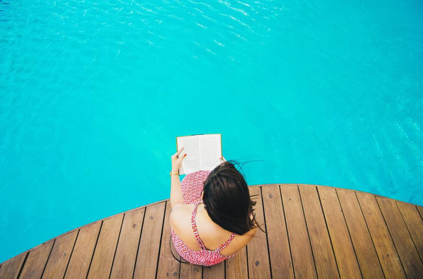 Reading Book at Poolside