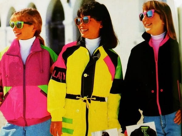 80s neon fashion of three women wearing different colors of neon