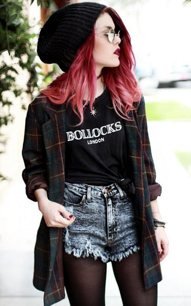 90s fashion with red hair influencer wearing plaid