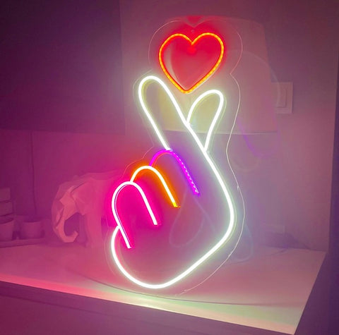 bts neon hearts in rainbow color glowing