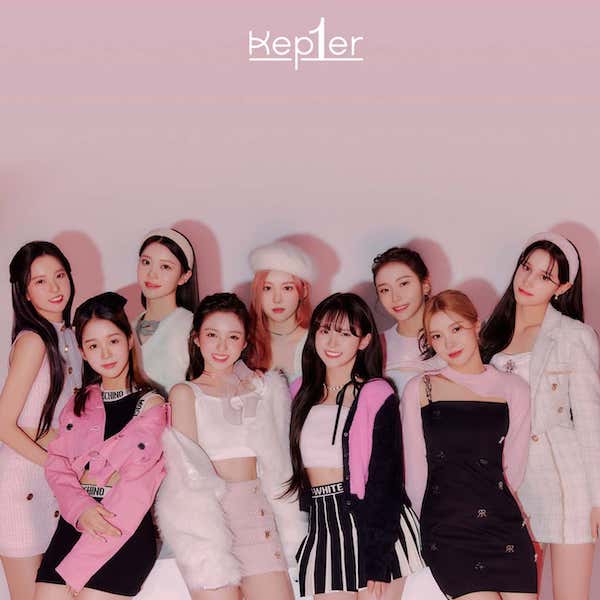 KEP1ER Kpop girl group matching in a group photo of pinks, whites and black