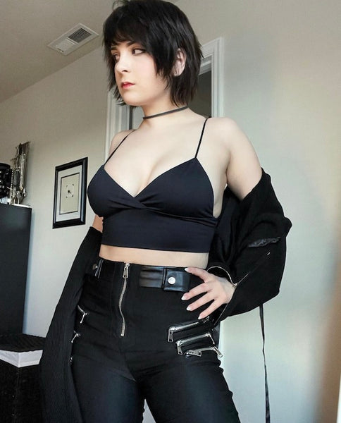 musubi-triangle-bralette with black zipper pants and black jacket
