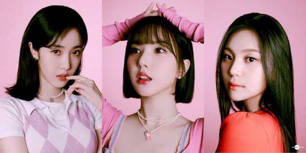 viviz kpop girl group three member in matching pastel outfits close up