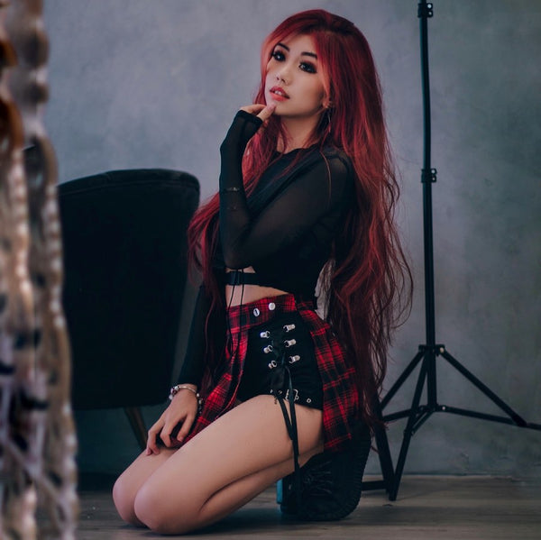 azuki lace up skirt and black mesh top on red hair model