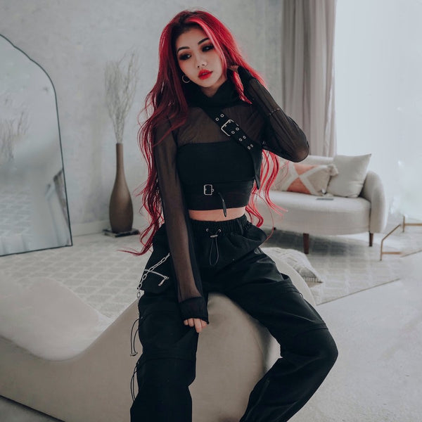 winter Kpop style black cargo bottoms and matching black top on red hair model