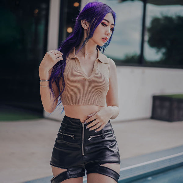 kombu pleather zipper leg short with beige polo crop top on purple hair model