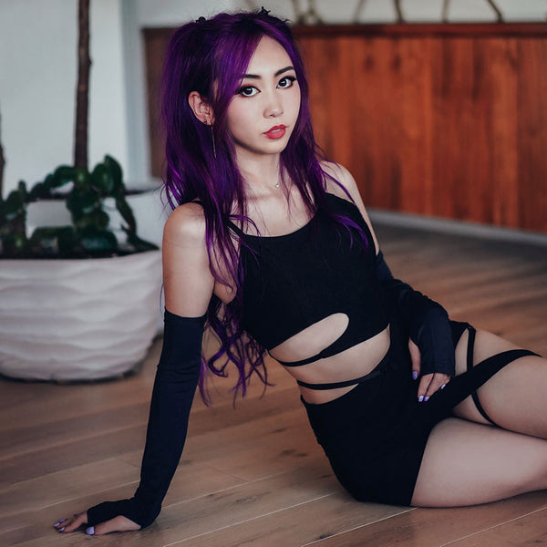 dashi top and sleeve set on purple hair model sitting down